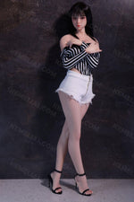 Load image into Gallery viewer, Lovely sweetheart Asian mini sex doll standing against a wall, both hands covering her chests, in a black and white stripped top leaving her bare shoulders exposed to everyone, while her slim long legs looks so smooth in a hyper short white pants, you can see her lovely small toes in a stripped black high heels that no longer available nowadays