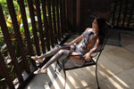 Load image into Gallery viewer, Slim long silhouette of realistic 120cm Filipina mini sex doll Tayani Rei sitting