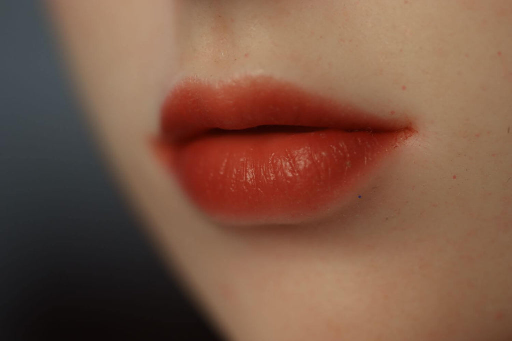 A closed view of beautiful Scandinavian Women Freya sex doll's red sexy lips